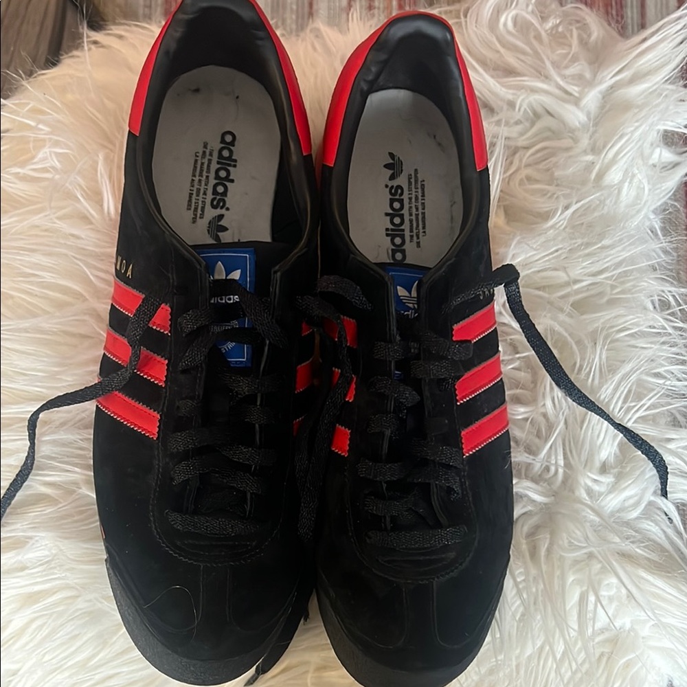 Adidas Black and Red Sneakers with Signature Stripes